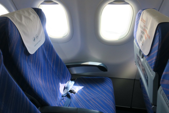 a blue and white airplane seats