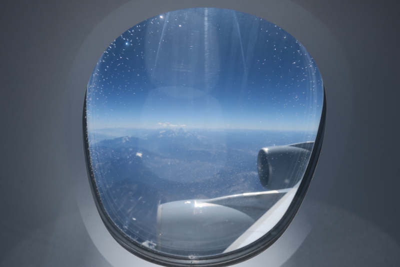a view of the sky from a window of an airplane