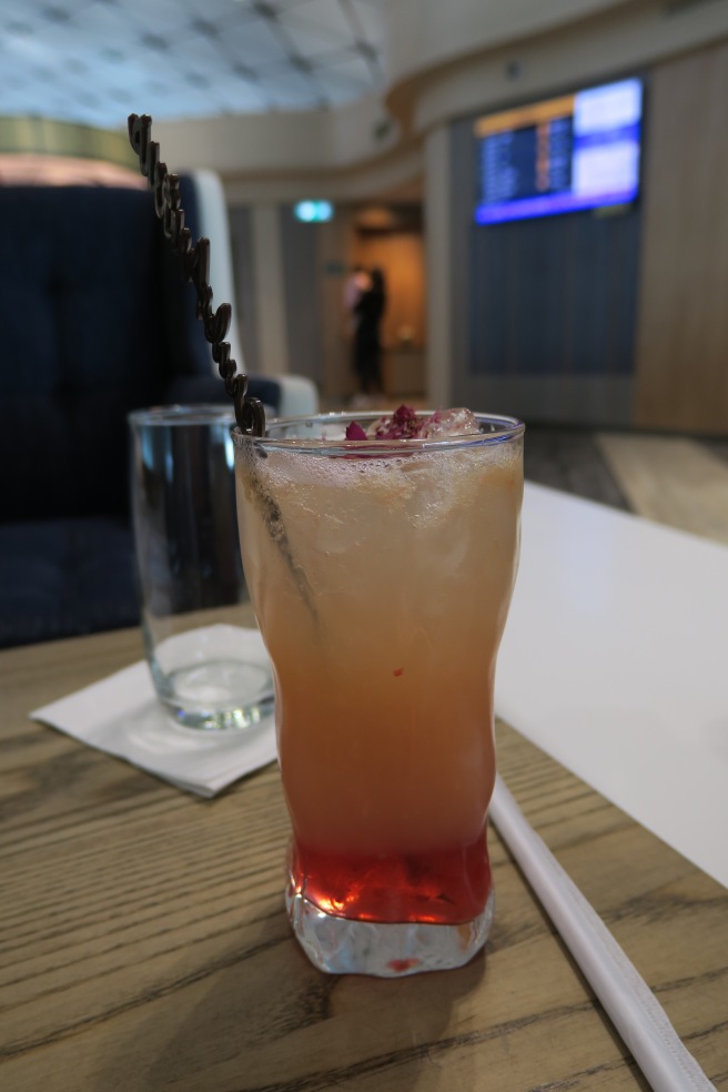 a glass with a straw in it