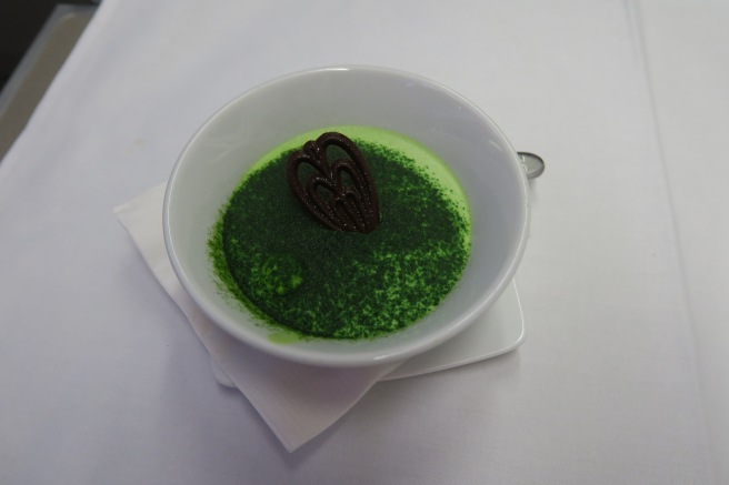 a bowl of green food