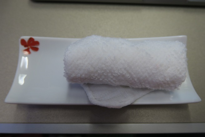 a white roll on a plate