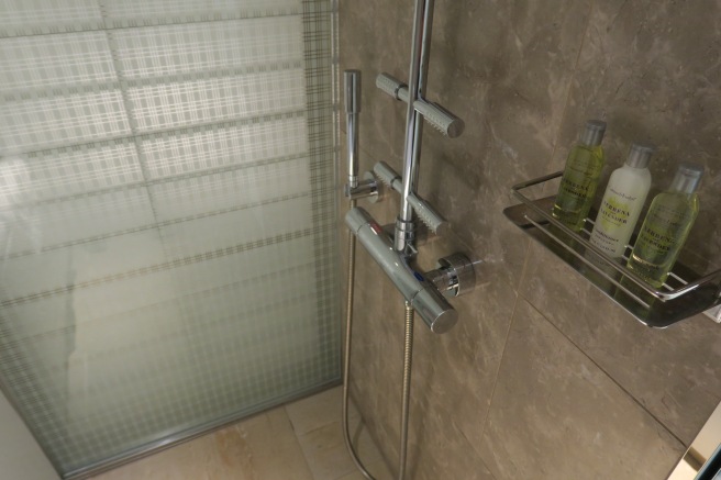 a shower head with a shower head and a shower head