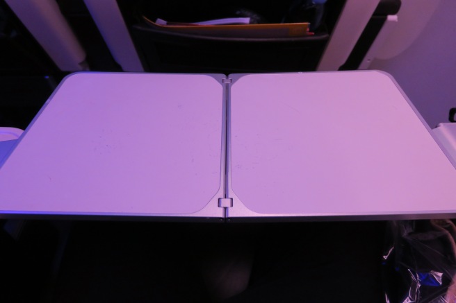 a white rectangular object with a hinge