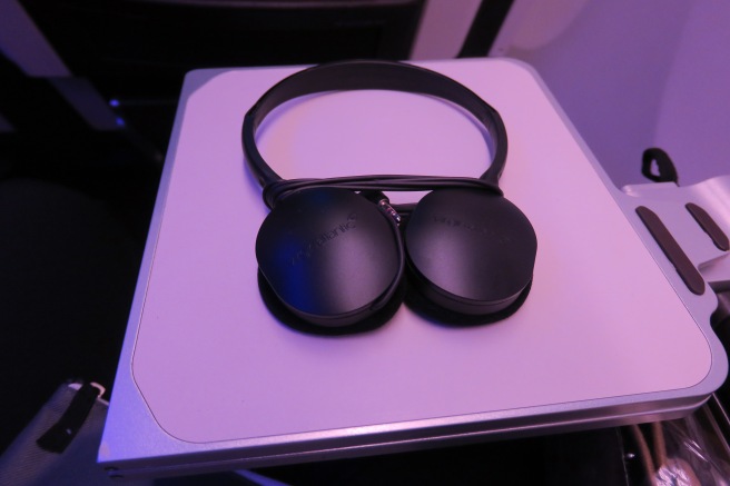 a pair of headphones on a white surface