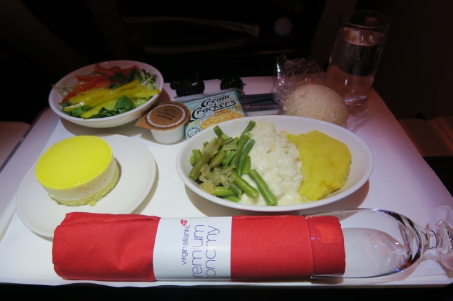 food on a tray with a napkin