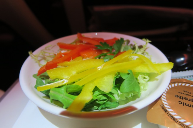 a bowl of salad with vegetables