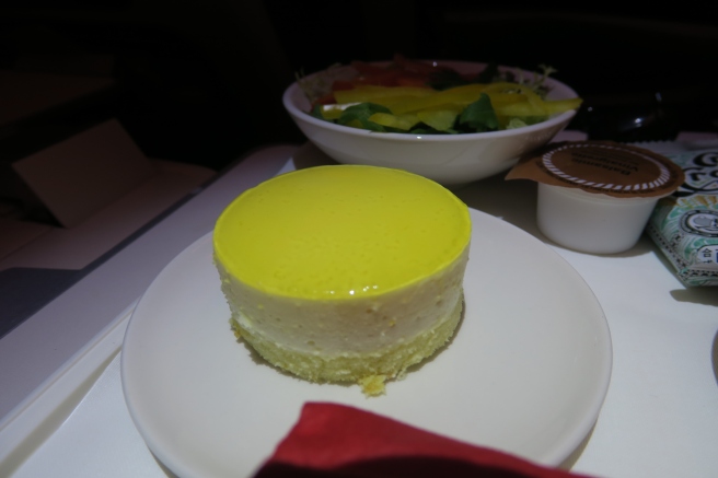 a yellow cake on a plate