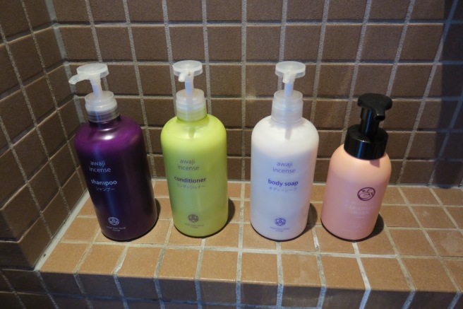 a group of bottles of shampoo and body soap