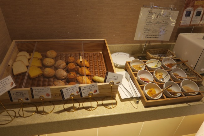 a trays of pastries and desserts on a counter