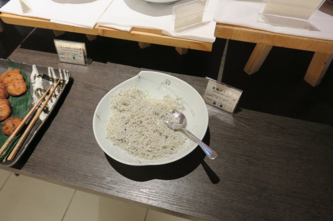 a bowl of noodles on a table