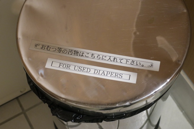 a trash can with a label on it