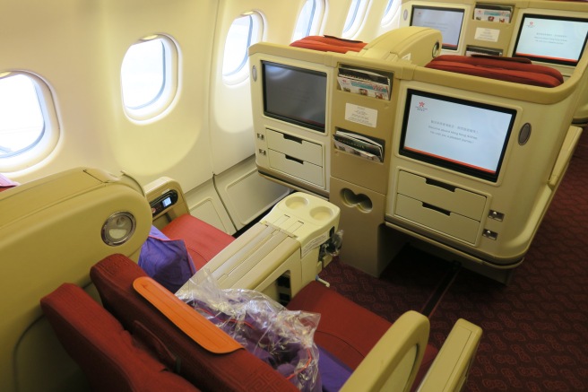 the inside of an airplane with a television