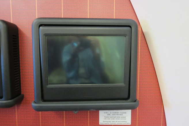 a small black rectangular device with a black plastic frame