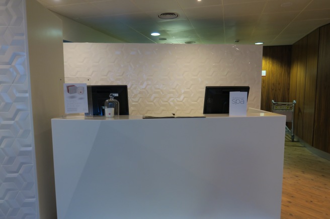a reception desk with computers