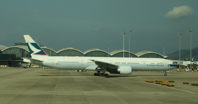 a large white airplane on the tarmac