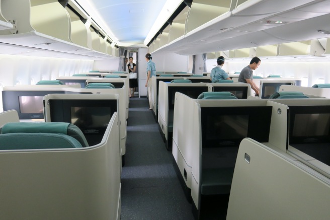 a passenger airplane with seats and people