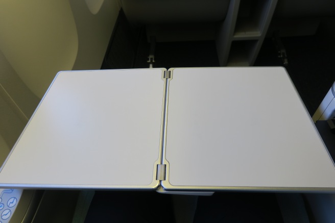 a white rectangular object with a metal frame