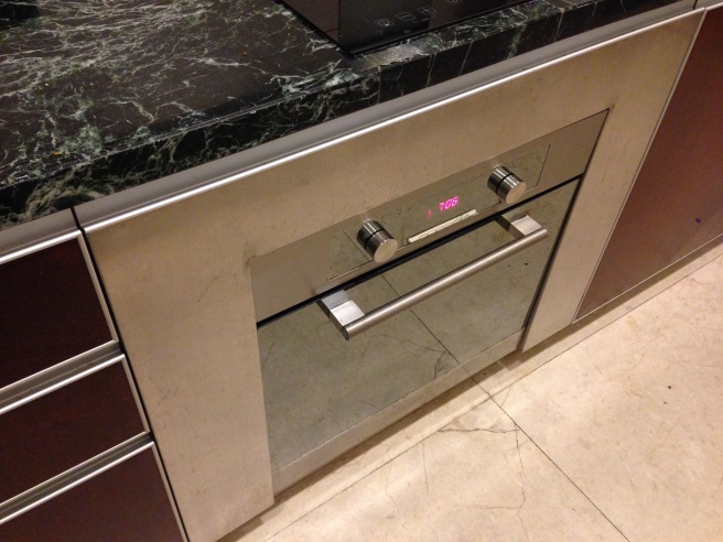 a oven with a display on the counter