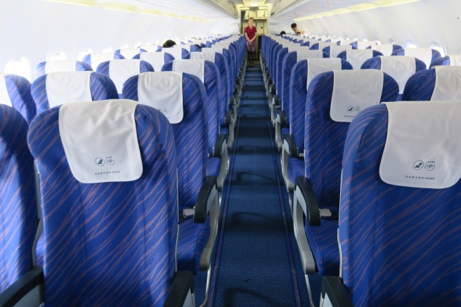 a row of blue and white seats