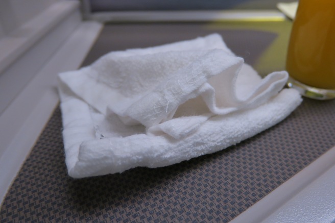 a white towel on a surface