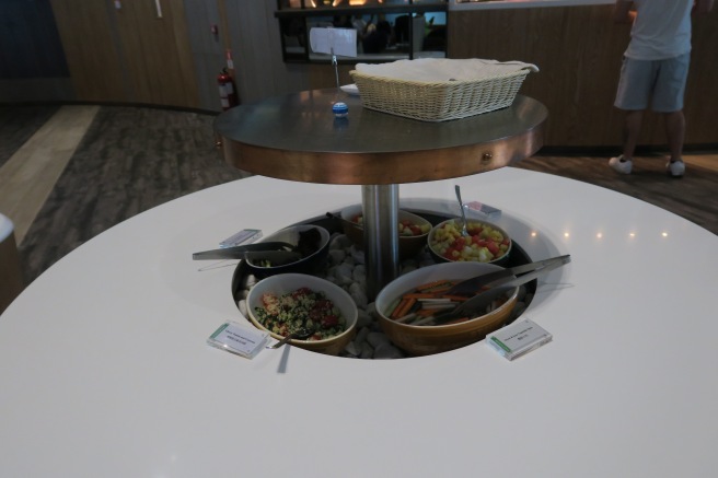 a table with bowls of food on it