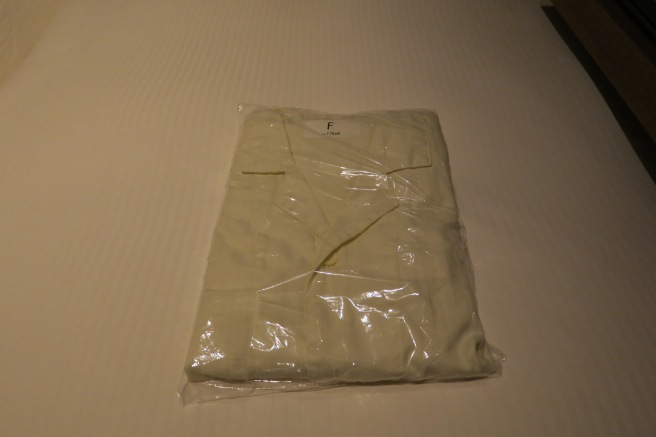 a white shirt in a plastic bag
