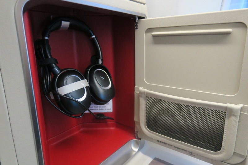 a pair of headphones in a small box