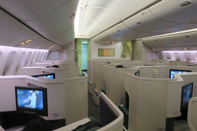 a plane with seats and a television