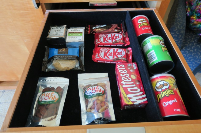 a drawer full of food and snacks