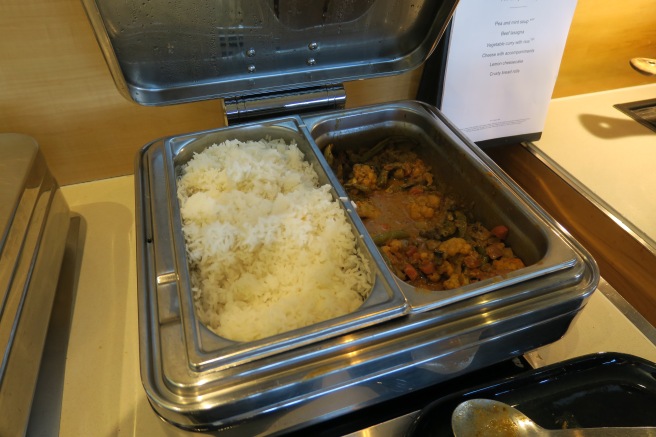 a tray of food with a lid open