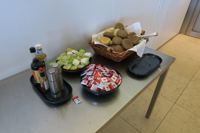 a table with food and condiments