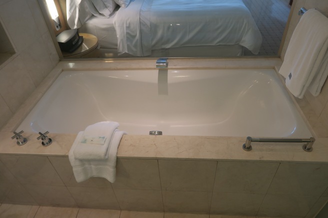 a bathtub in a hotel room