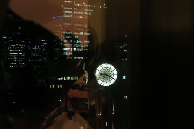 a clock in front of a window