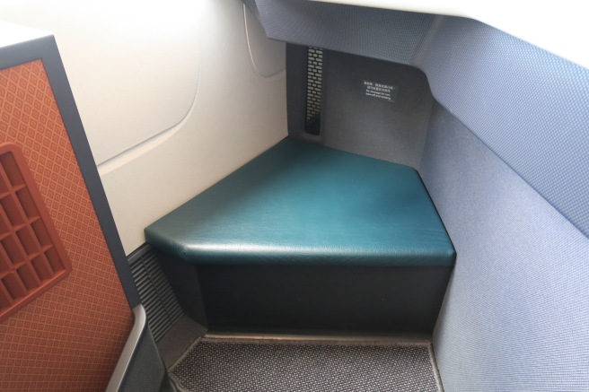 a corner of a seat in a plane