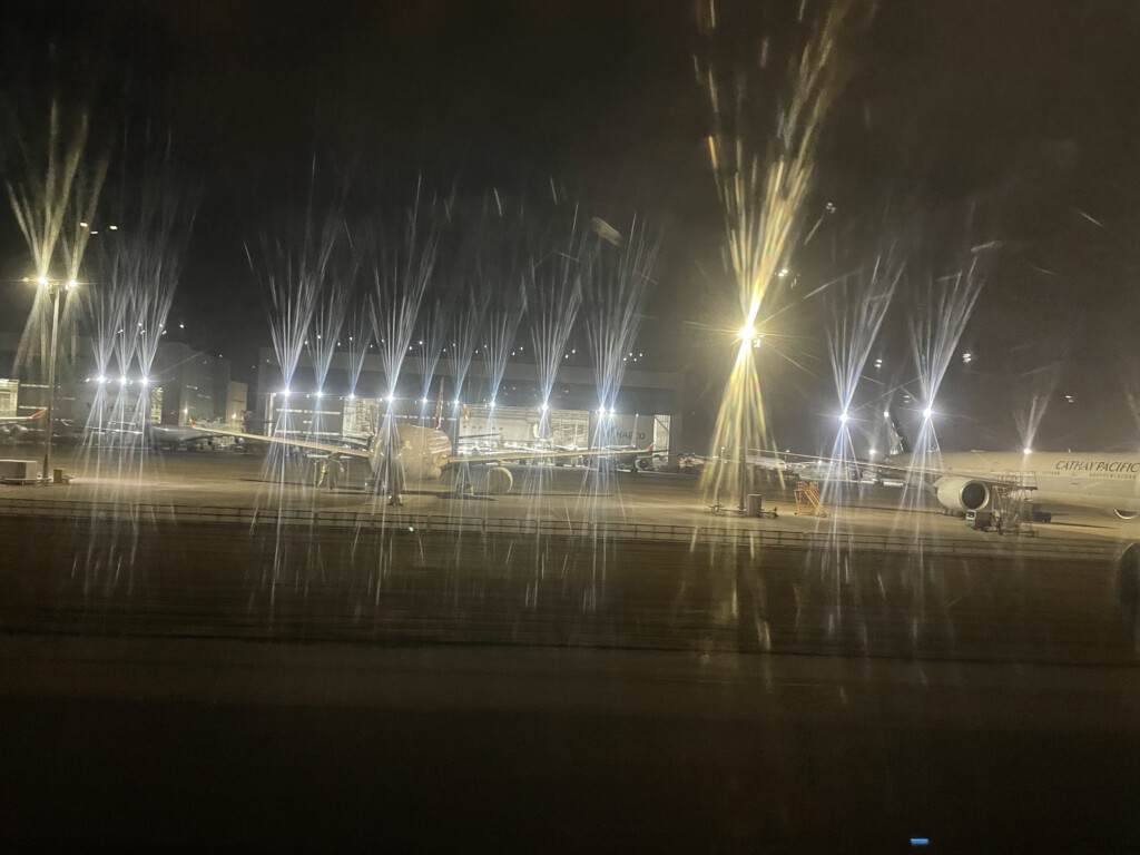 jets in a parking lot at night