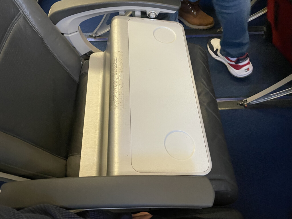 a seat with a tray on it