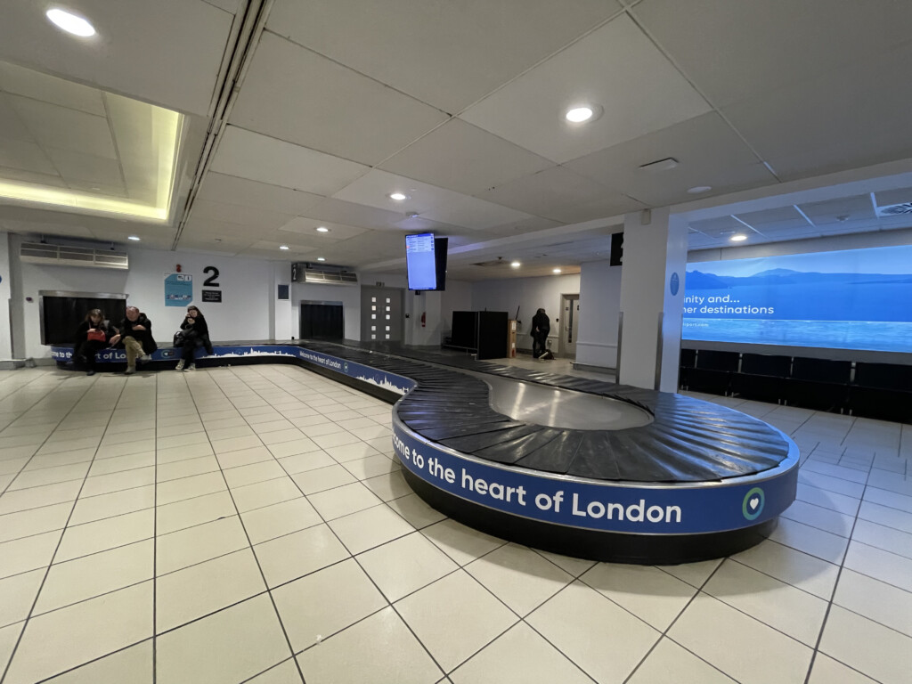 a luggage carousel in a building