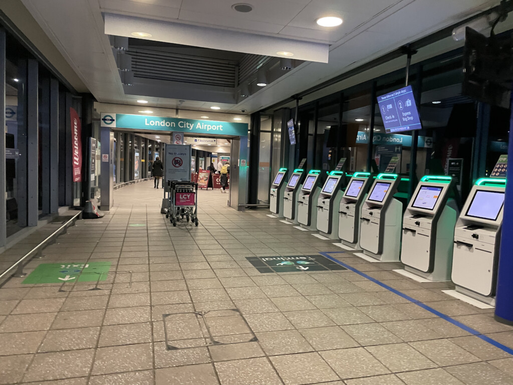 a row of kiosks in a terminal