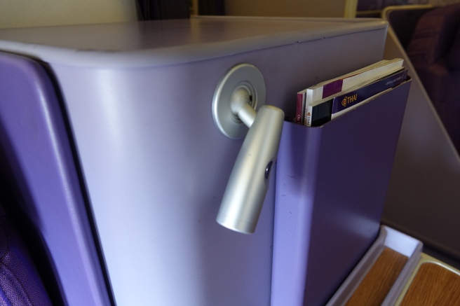 a purple box with a handle and a keyhole