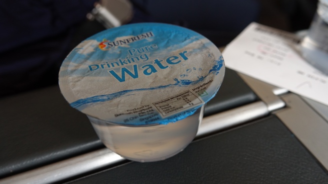 a plastic cup of water