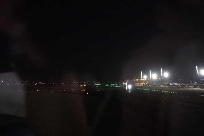 a view of a runway at night
