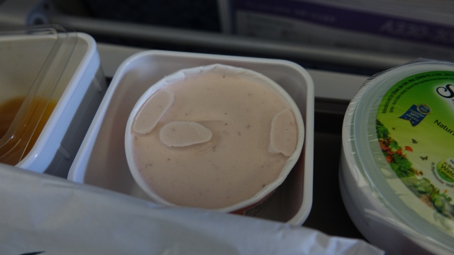 a container of yogurt in a plastic container