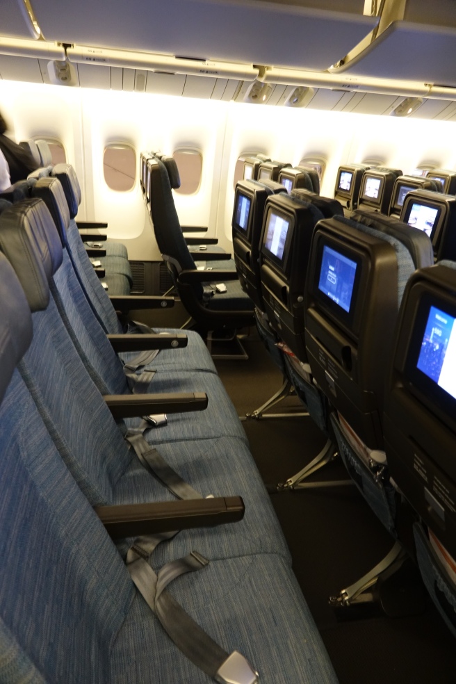 seats in an airplane with a row of seats