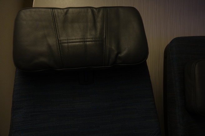 a black leather seat cushion