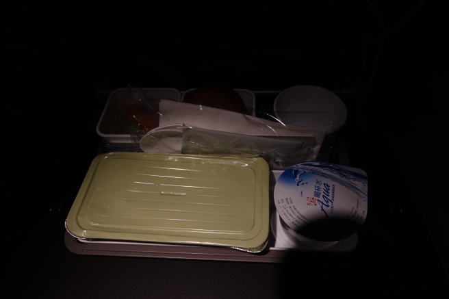 a tray of food and a napkin