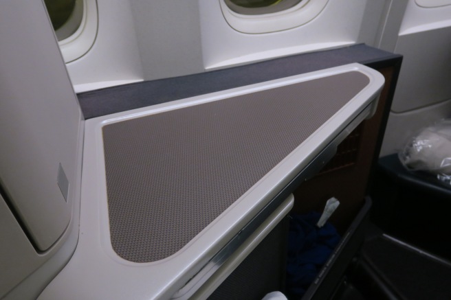 a shelf in an airplane