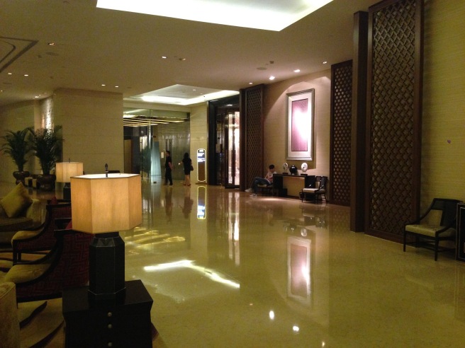 a lobby with a large floor