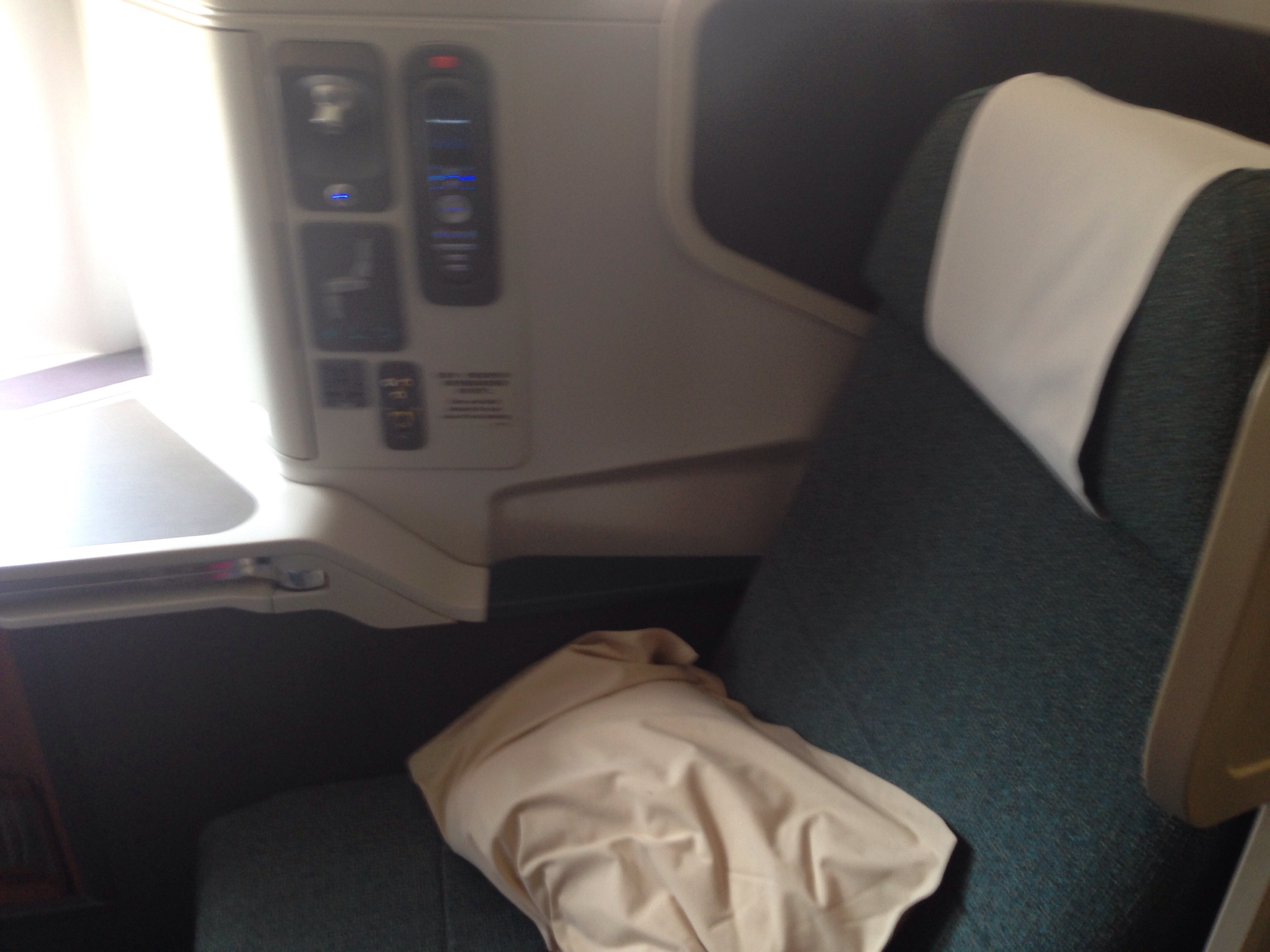 a seat with a pillow on it