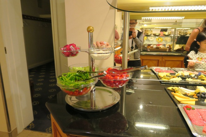 a buffet with food on a counter
