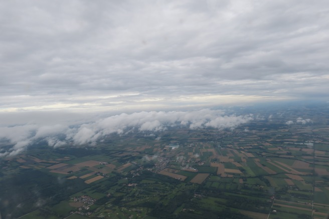 aerial view of a landscape with clouds